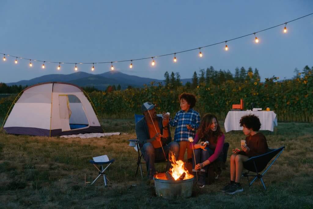 Family toasting marshmallows over a campfire in eastern Washington.